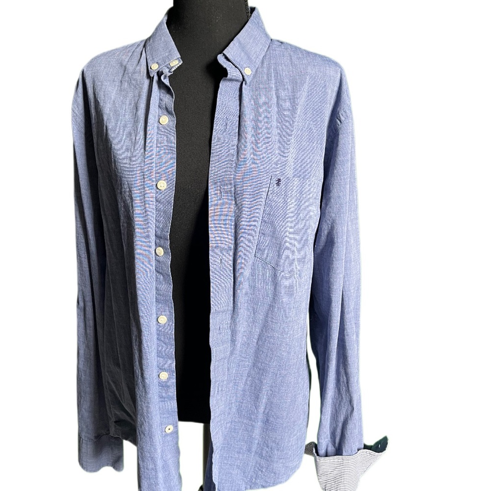 2 lightly worn men’s dress shirts.  Both are Large.  See brand in pictures.